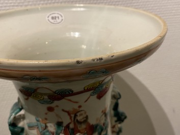 Two Chinese famille rose 'court scene' vases, 19th C.
