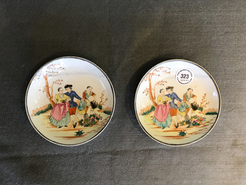 A pair of fine Chinese famille rose 'European subject' cups and saucers, Qianlong
