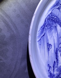 Two Chinese blue and white 'river landscape' dishes, Kangxi/Yongzheng