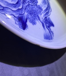 Two Chinese blue and white 'river landscape' dishes, Kangxi/Yongzheng