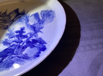 Two Chinese blue and white 'river landscape' dishes, Kangxi/Yongzheng