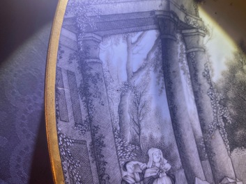 A Chinese grisaille 'Return from the hunt' dish with a coat of arms on the back, Qianlong