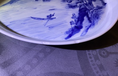 Two Chinese blue and white 'river landscape' dishes, Kangxi/Yongzheng