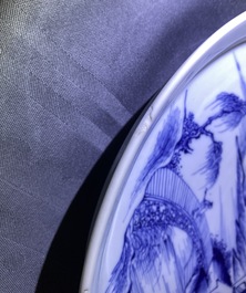 Two Chinese blue and white 'river landscape' dishes, Kangxi/Yongzheng