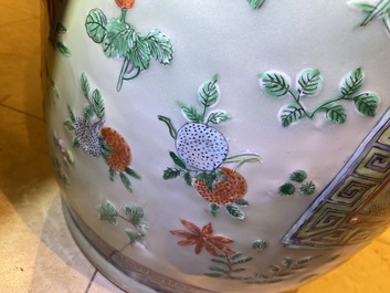 A pair of large Chinese famille verte celadon-ground vases with figural design, 19th C.