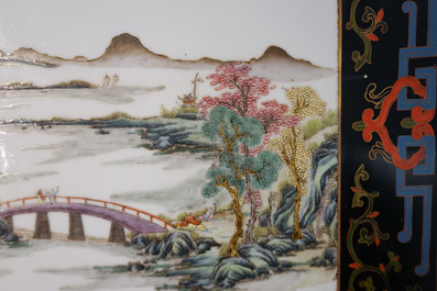 Two Chinese famille rose landscape plaques in a lacquered chest, marked Wang Yeting, 19/20th C.