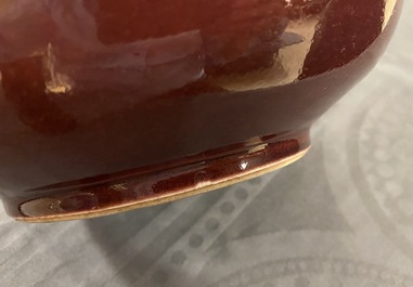 A Chinese monochrome red bottle vase, Kangxi
