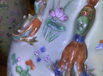 A pair of large Chinese famille verte celadon-ground vases with figural design, 19th C.