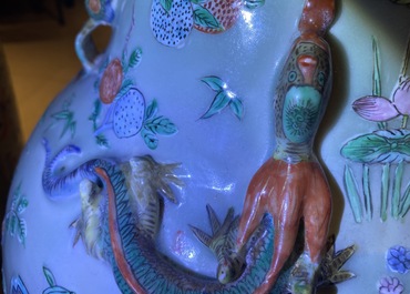 A pair of large Chinese famille verte celadon-ground vases with figural design, 19th C.