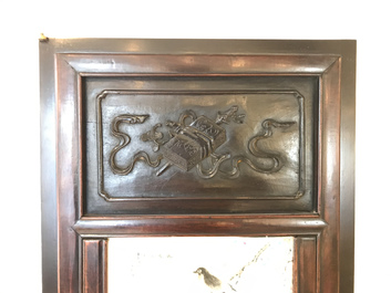 A Chinese wooden closet with 23 qianjiang cai plaques, 19/20th C.