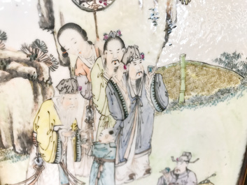 A Chinese wooden closet with 23 qianjiang cai plaques, 19/20th C.