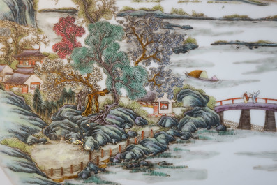 Two Chinese famille rose landscape plaques in a lacquered chest, marked Wang Yeting, 19/20th C.