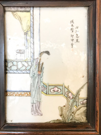 A Chinese wooden closet with 23 qianjiang cai plaques, 19/20th C.