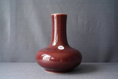 A Chinese monochrome red bottle vase, Kangxi