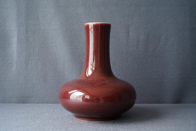 A Chinese monochrome red bottle vase, Kangxi