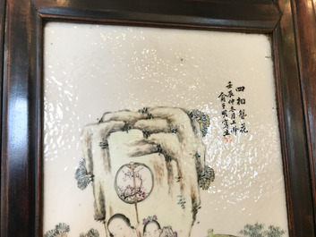 A Chinese wooden closet with 23 qianjiang cai plaques, 19/20th C.