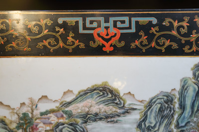 Two Chinese famille rose landscape plaques in a lacquered chest, marked Wang Yeting, 19/20th C.