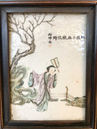A Chinese wooden closet with 23 qianjiang cai plaques, 19/20th C.
