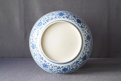 A Chinese Ming-style blue and white 'floral scroll' dish, Qianlong