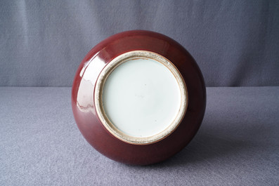 A Chinese monochrome red bottle vase, Kangxi