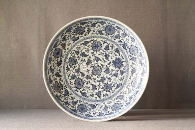 A Chinese Ming-style blue and white 'floral scroll' dish, Qianlong