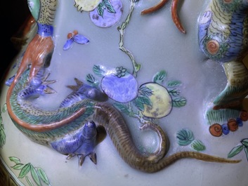 A pair of large Chinese famille verte celadon-ground vases with figural design, 19th C.