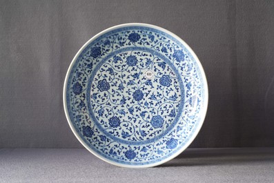A Chinese Ming-style blue and white 'floral scroll' dish, Qianlong