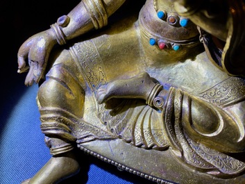 Une figure de Tara en bronze dor&eacute; incrust&eacute; de corail et turquoise, Sino-Tibet, 18&egrave;me