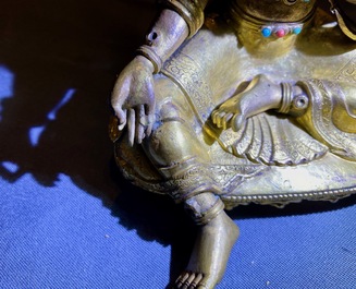 Une figure de Tara en bronze dor&eacute; incrust&eacute; de corail et turquoise, Sino-Tibet, 18&egrave;me
