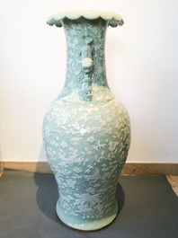 A large Chinese slip-decorated celadon-ground vase, 19th C.