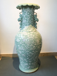 A large Chinese slip-decorated celadon-ground vase, 19th C.