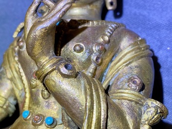 Une figure de Tara en bronze dor&eacute; incrust&eacute; de corail et turquoise, Sino-Tibet, 18&egrave;me