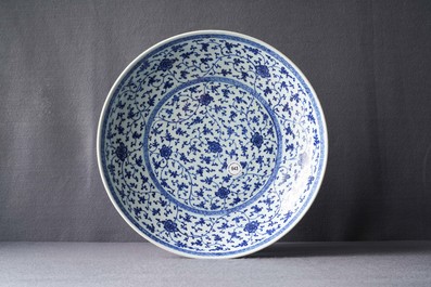 A Chinese Ming-style blue and white 'floral scroll' dish, Qianlong