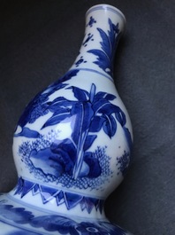 A Chinese blue and white double gourd vase, Transitional period