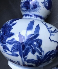 A Chinese blue and white double gourd vase, Transitional period