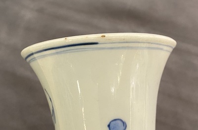 A Chinese blue and white bottle vase with floral design, Transitional period