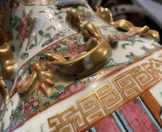 A pair of Chinese Canton famille rose vases and a bowl, 19th C.