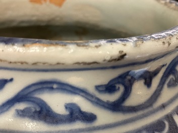 A Chinese blue and white jar with birds in a landscape, Wanli