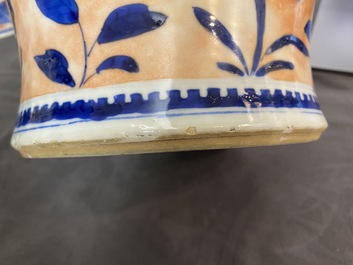A Chinese blue and white clobbered 'qilin and phoenix' vase and cover, 19th C.