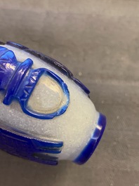 Nine various Chinese blue overlay and transparent glass snuff bottles, 19/20th C.