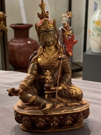Five Sino-Tibetan gilt bronze Buddha figures, 19/20th C.