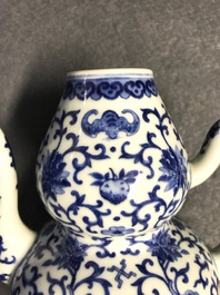 A Chinese blue and white 'bats and shou' jug, 19th C.