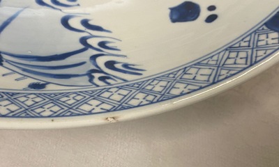 A Chinese blue and white dish with a narrative scene, Kangxi