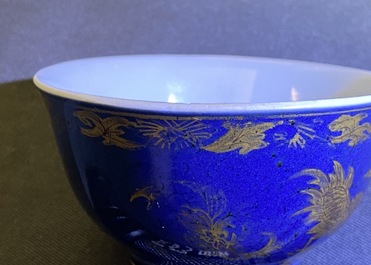 A Chinese gilt-decorated powder blue cream jug, a tea caddy and a tea bowl with roosters, Yongzheng