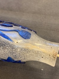 Nine various Chinese blue overlay and transparent glass snuff bottles, 19/20th C.