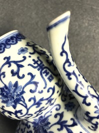 A Chinese blue and white 'bats and shou' jug, 19th C.
