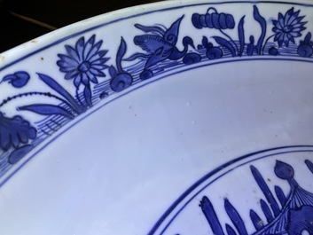 A massive Chinese blue and white landscape charger, Jiajing