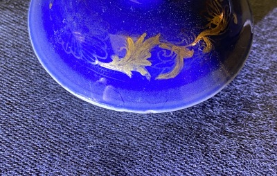 A Chinese gilt-decorated powder blue cream jug, a tea caddy and a tea bowl with roosters, Yongzheng