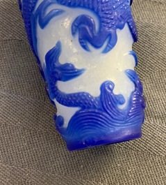 Nine various Chinese blue overlay and transparent glass snuff bottles, 19/20th C.