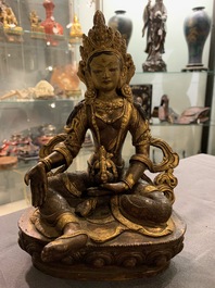 Five Sino-Tibetan gilt bronze Buddha figures, 19/20th C.
